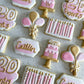 20th Birthday Cookies. Birthday cake, candle, balloon, name, and number designs. Pink, white, and gold cookies